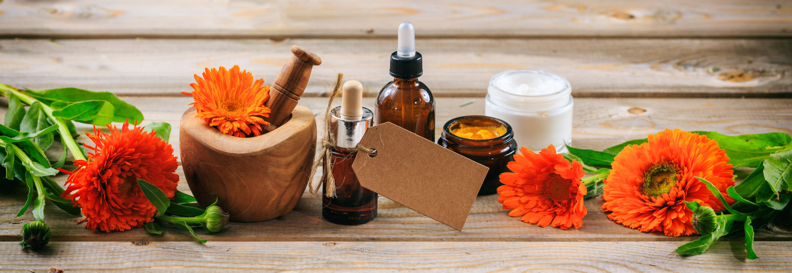 Calendula aromatherapy. Essential oil and cosmetics, blank tag,